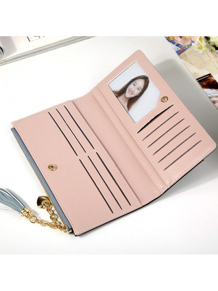 Hengsheng new lady's purse long fashion tassel multi card zipper button handbag factory sales