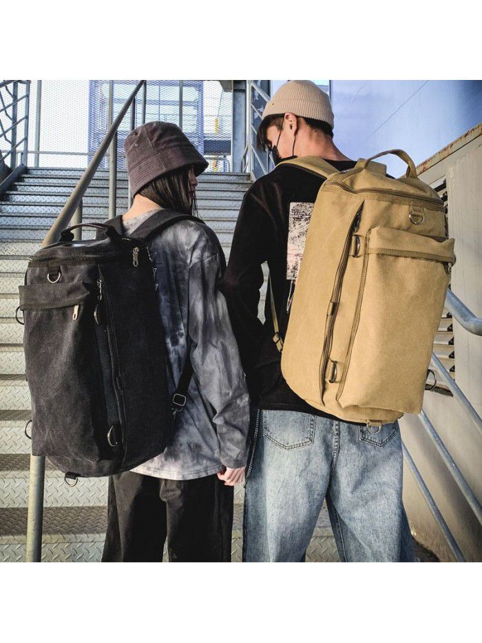 Fashion men's bag large capacity Travel Backpack men's outdoor travel sports cylinder backpack trend canvas schoolbag