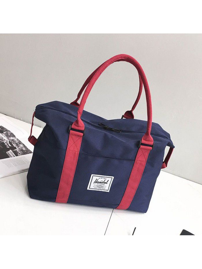 Manufacturers wholesale boarding bags, solid color, large capacity, wear-resistant and load reducing, customized hand-held travel bags, luggage bags and travel bags