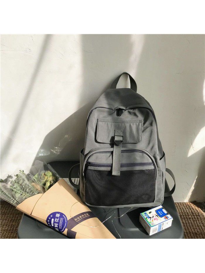 Student Backpack NEW leisure chaoku composite cloth load reducing wear resistant waterproof port wind work clothes men's and women's schoolbag 