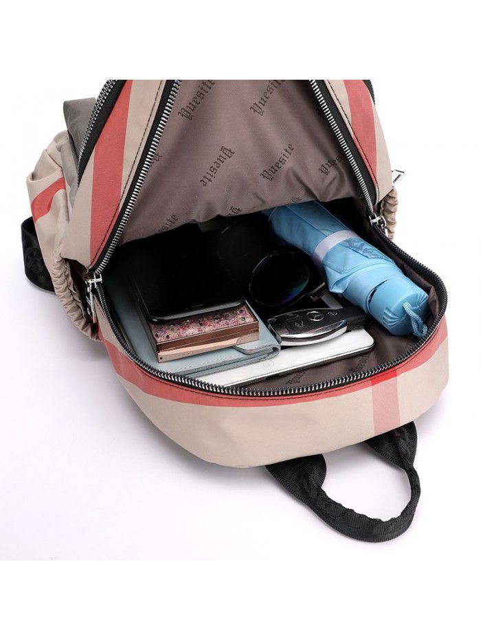 New light backpack stripe nylon bag women's leisure backpack fashion trend middle aged mother bag