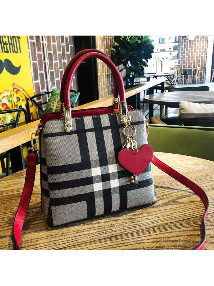 Hong Kong Women's leather bag 2021 new fashion goddess portable one shoulder versatile lattice messenger bag