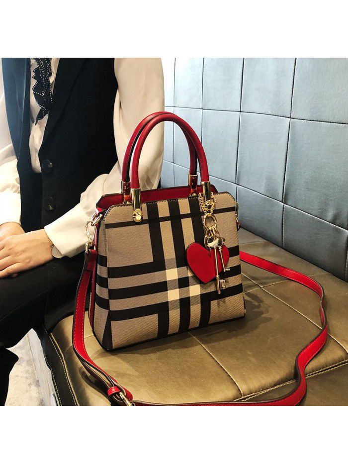 Hong Kong Women's leather bag 2021 new fashion goddess portable one shoulder versatile lattice messenger bag