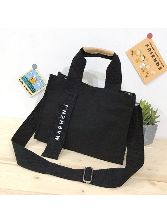 Autumn and winter 2020 new canvas large capacity women's handbag comfortable broadband solid Japanese style shoulder bag