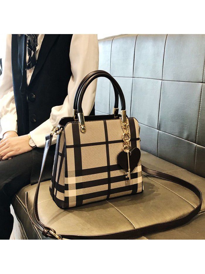 Hong Kong Women's leather bag 2021 new fashion goddess portable one shoulder versatile lattice messenger bag