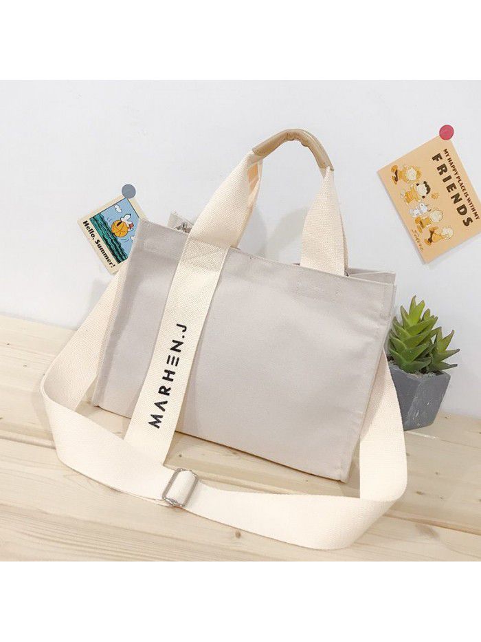 Autumn and winter 2020 new canvas large capacity women's handbag comfortable broadband solid Japanese style shoulder bag