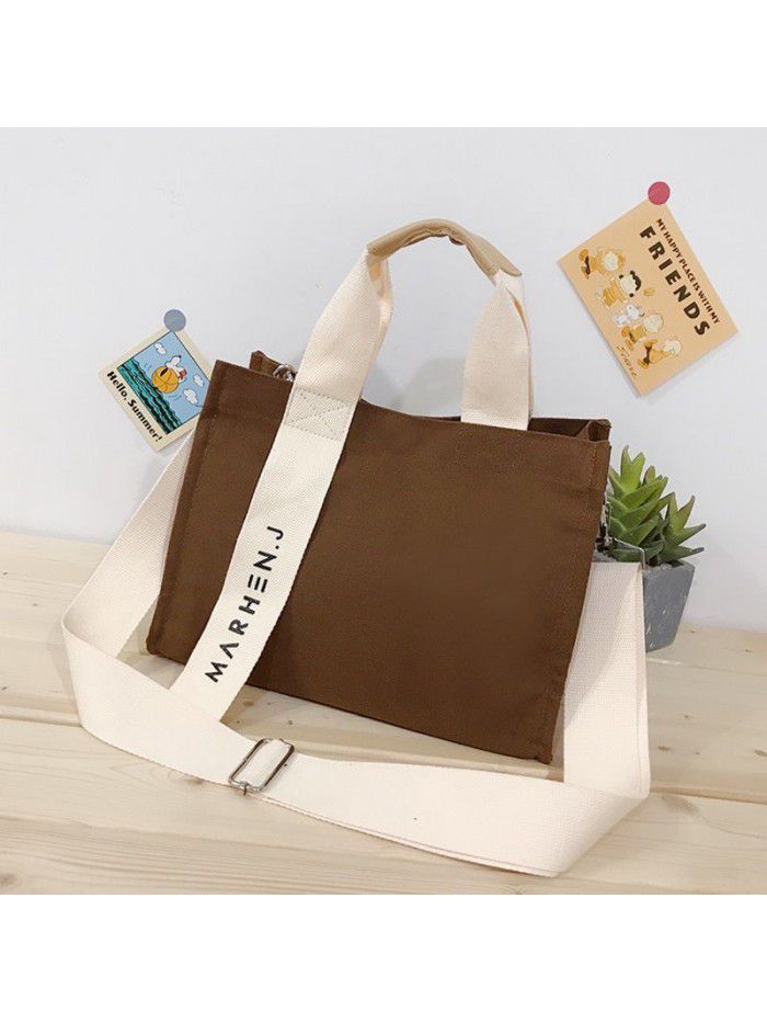 Autumn and winter 2020 new canvas large capacity women's handbag comfortable broadband solid Japanese style shoulder bag