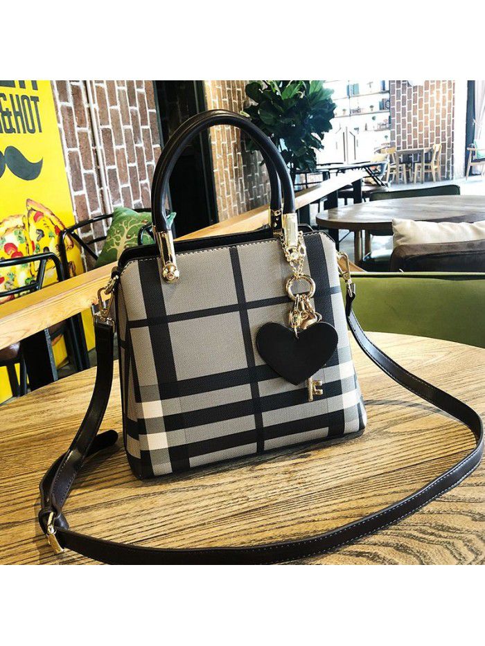 Hong Kong Women's leather bag 2021 new fashion goddess portable one shoulder versatile lattice messenger bag