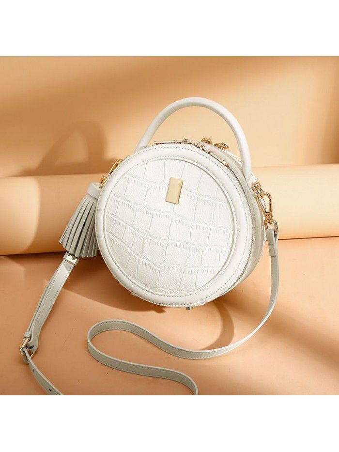 Bag women's 2021 new fashion round real leather bag single shoulder slant span bag women's niche large capacity handbag