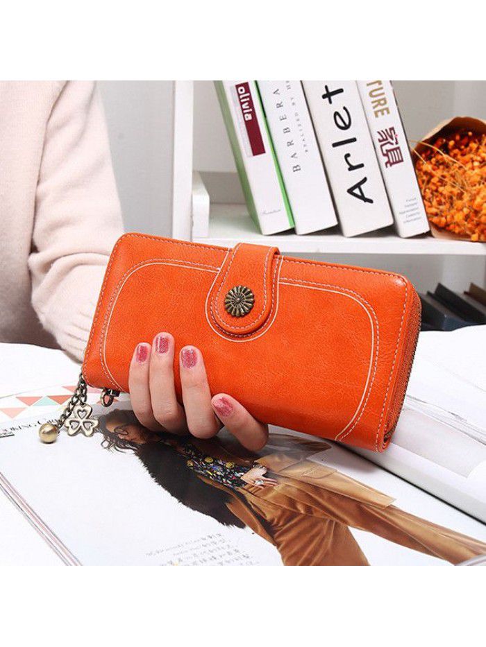 Women's three fold zipper wallet long oil wax leather hand bag foreign trade multi card oil skin mobile phone bag n826