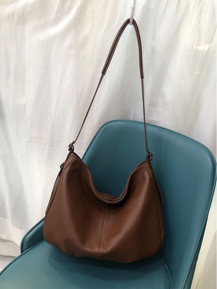 Cross border leather women's bag 2021 new European and American fashion bag top layer cow leather natural drop crossbar single shoulder bag 1082