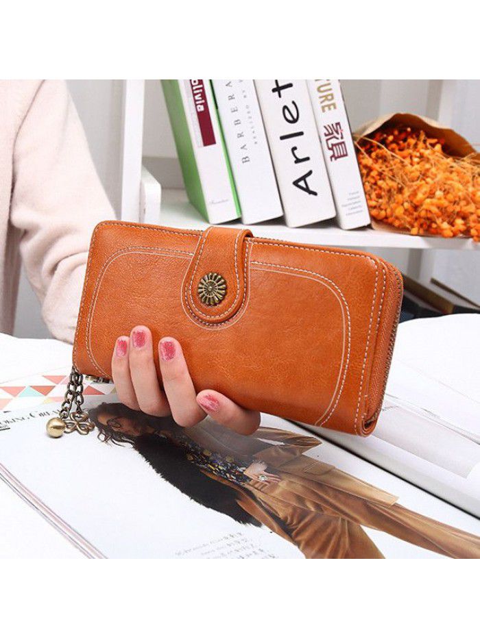 Women's three fold zipper wallet long oil wax leather hand bag foreign trade multi card oil skin mobile phone bag n826