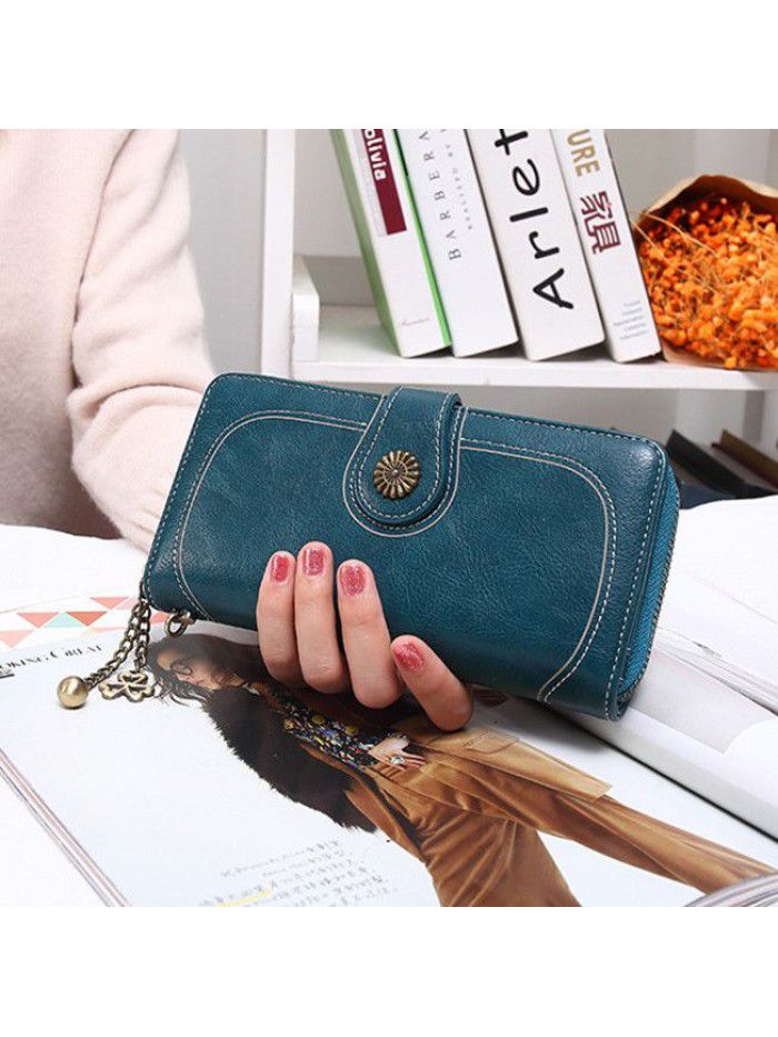 Women's three fold zipper wallet long oil wax leather hand bag foreign trade multi card oil skin mobile phone bag n826