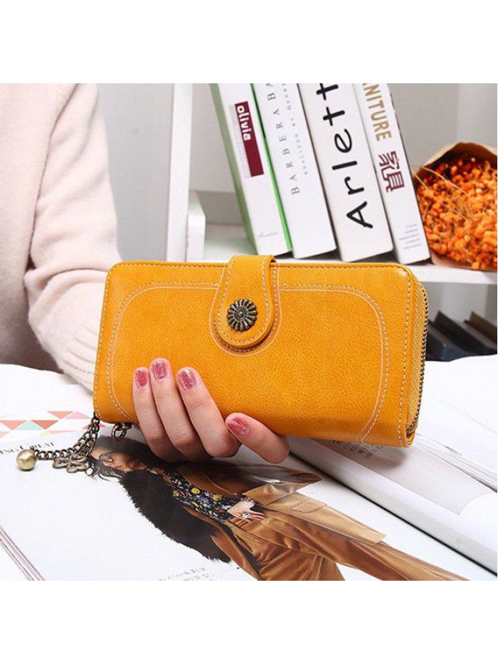 Women's three fold zipper wallet long oil wax leather hand bag foreign trade multi card oil skin mobile phone bag n826