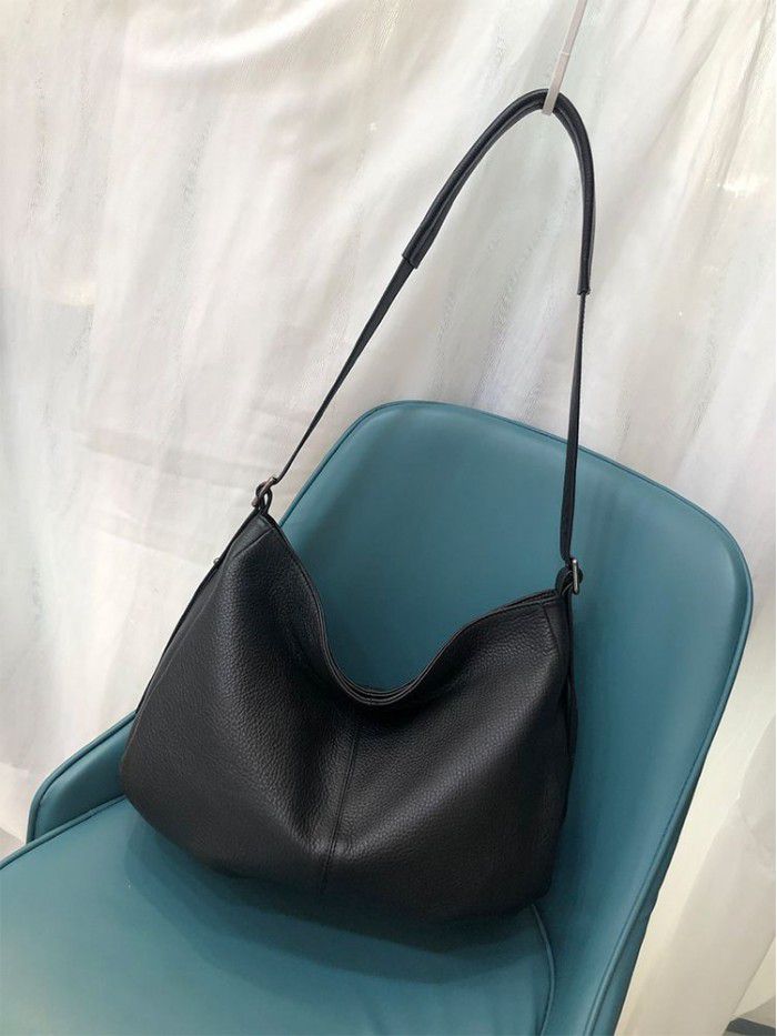 Cross border leather women's bag 2021 new European and American fashion bag top layer cow leather natural drop crossbar single shoulder bag 1082