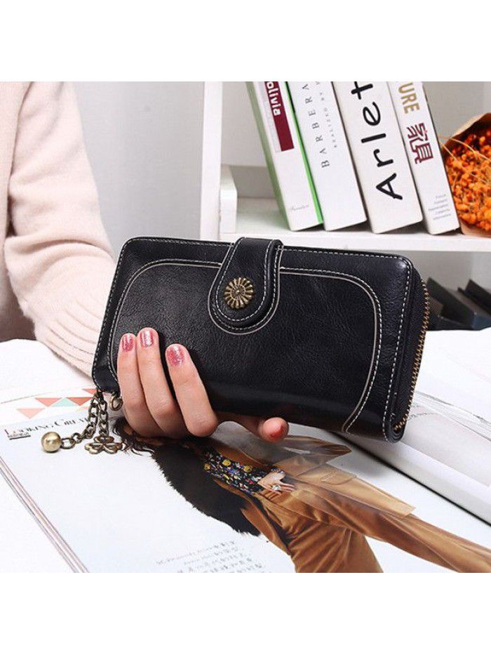 Women's three fold zipper wallet long oil wax leather hand bag foreign trade multi card oil skin mobile phone bag n826