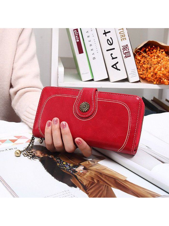 Women's three fold zipper wallet long oil wax leather hand bag foreign trade multi card oil skin mobile phone bag n826