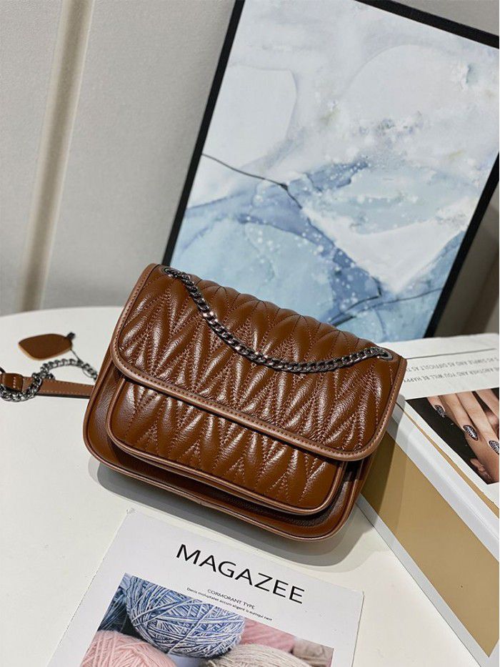 Xiaoxiangfeng Lingge chain bag 2021 new fashion leather women's bag small CK One Shoulder Messenger Bag small bag women's 9860