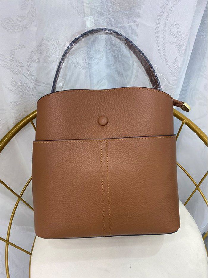 Cowhide women's bag 2021 new Korean one shoulder slung fashion handbag niche Design Leather bucket bag 8809