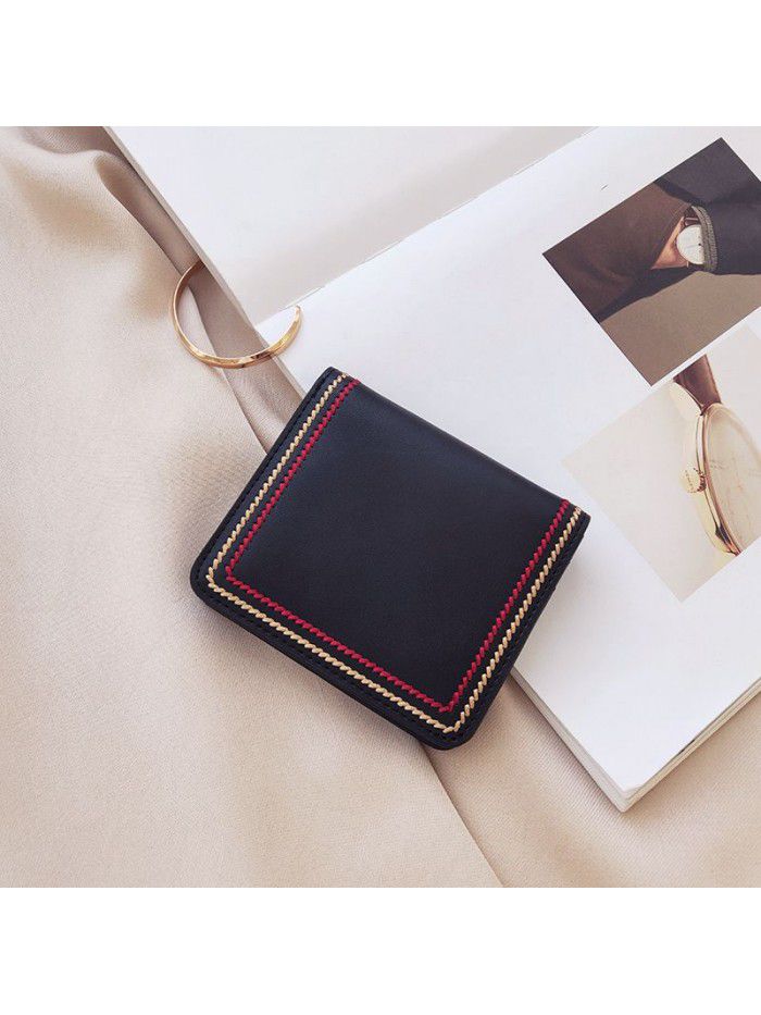 Leather Wallet women's short 2020 new small fresh women's folding card bag Korean version simple, compact and ultra thin fashion